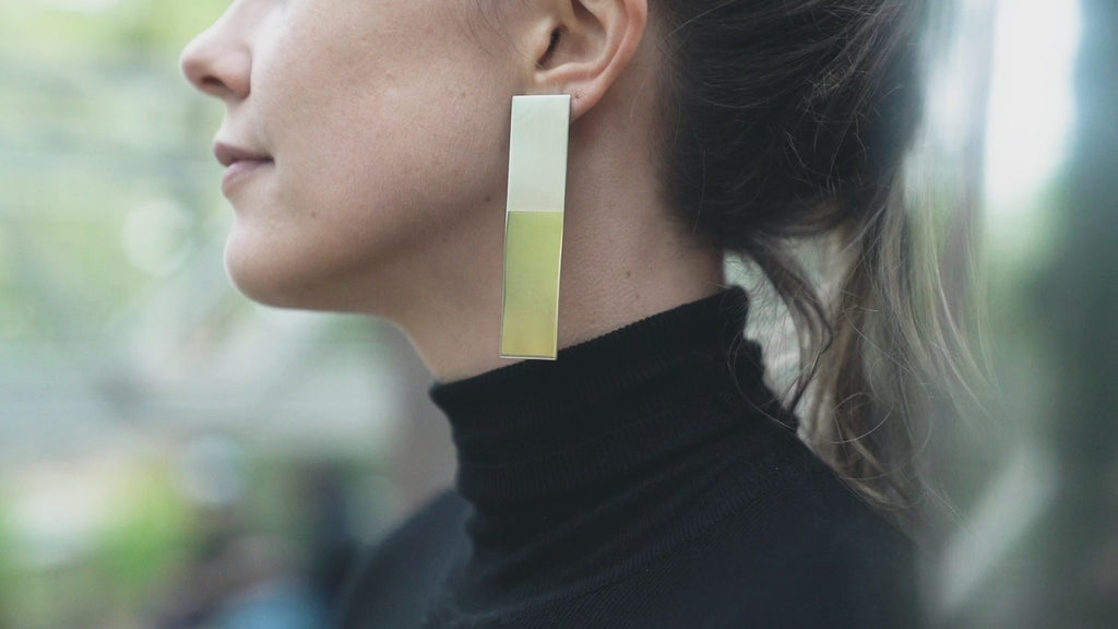 large mirror-reflective silver earring