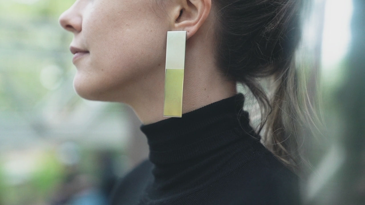 large mirror-reflective silver earring