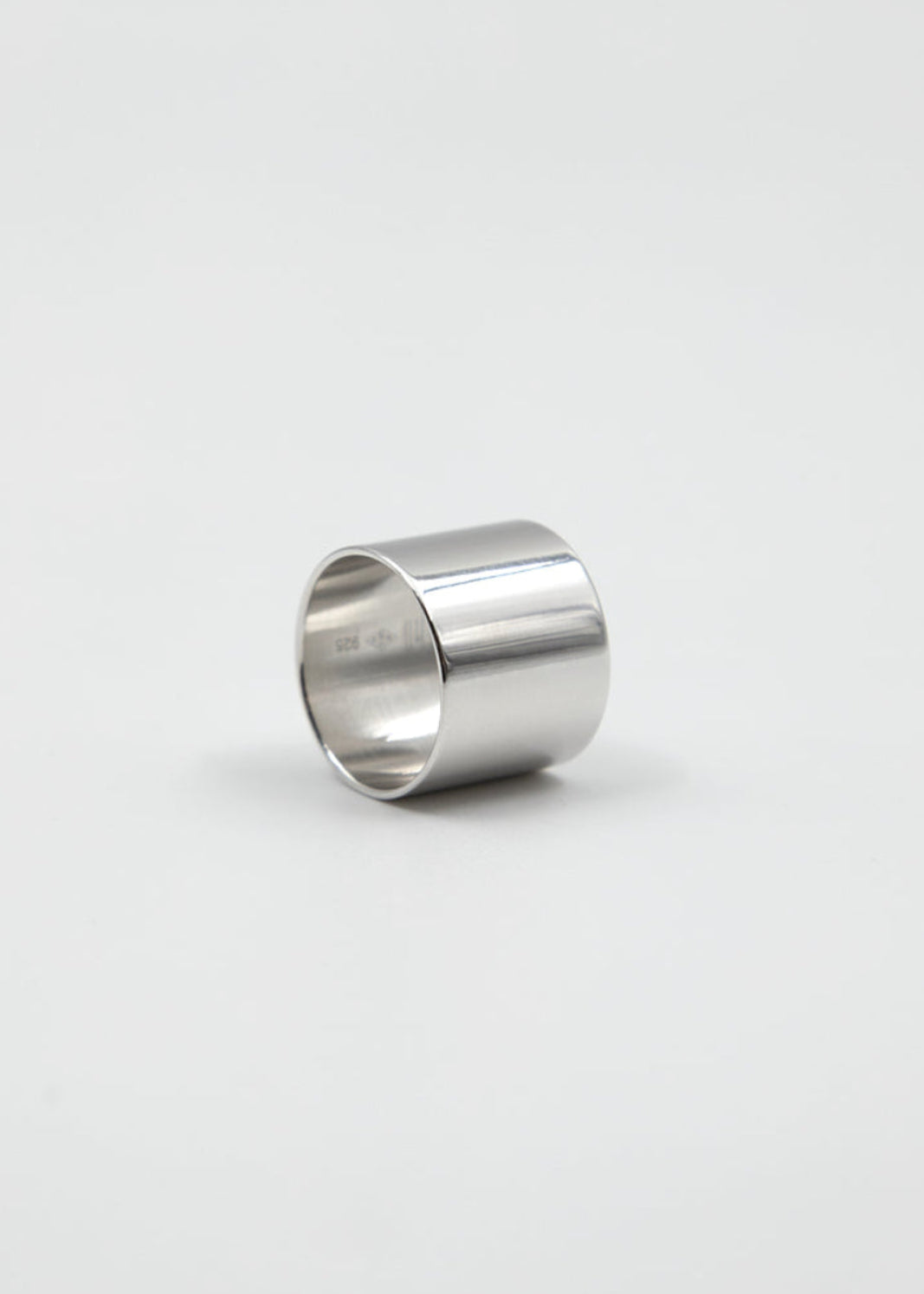 Silver ring on a white background